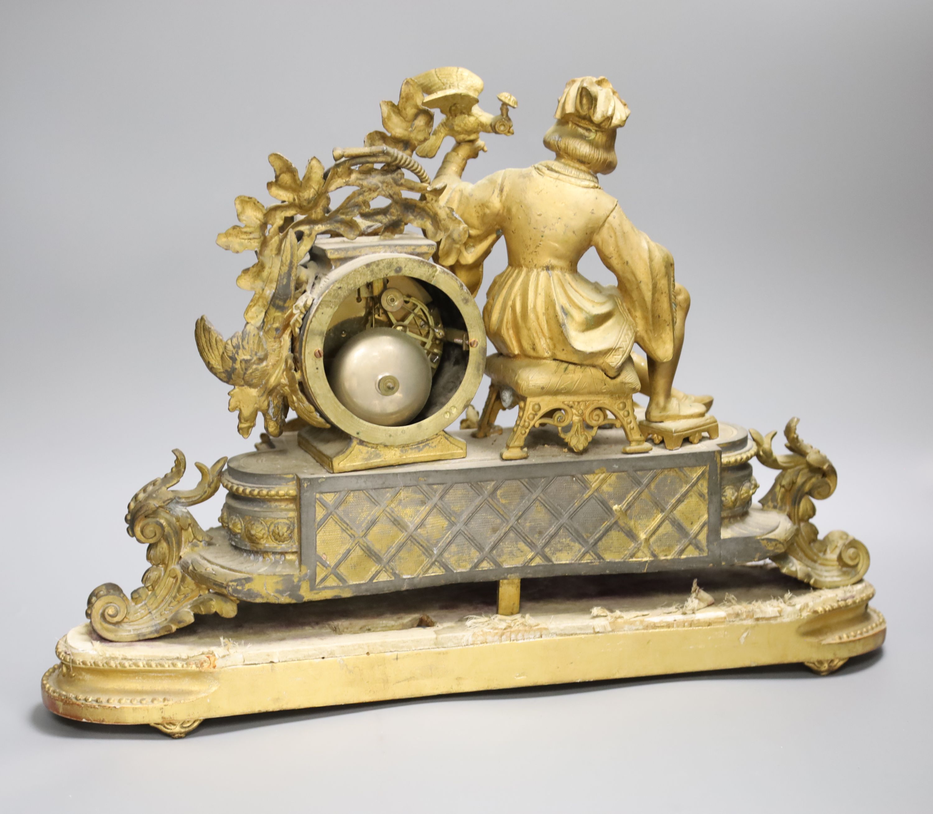 A French gilt metal figural mantel clock and base, overall height 34cm